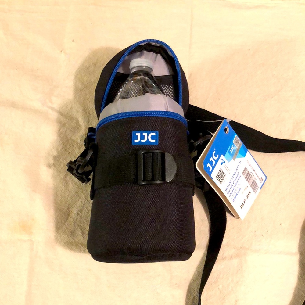 NWTO JJC Deluxe Lens Pouch fits low 3.15” x 5.98” (D x L). Shoulder & belt strap
